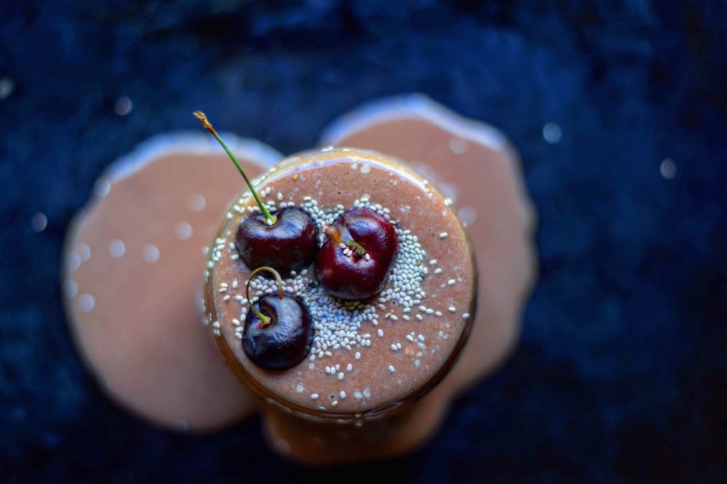 Overhead shot of one of my fav Arbonne Shake Recipes with cherries on top.