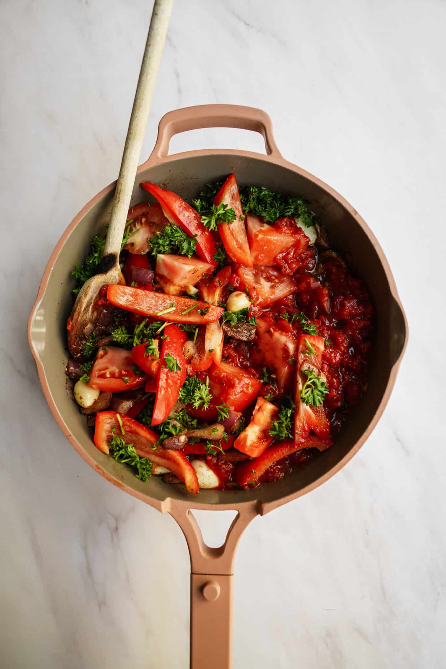 Tomatoes in pot for vegan pasta recipes
