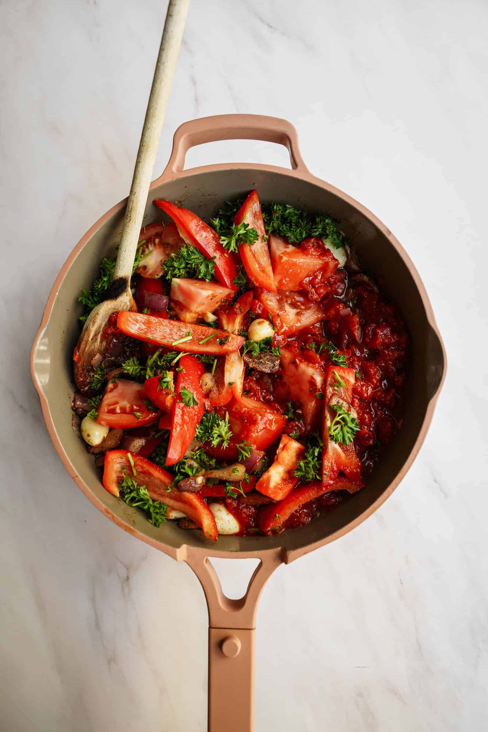 Tomatoes in pot for vegan pasta recipes