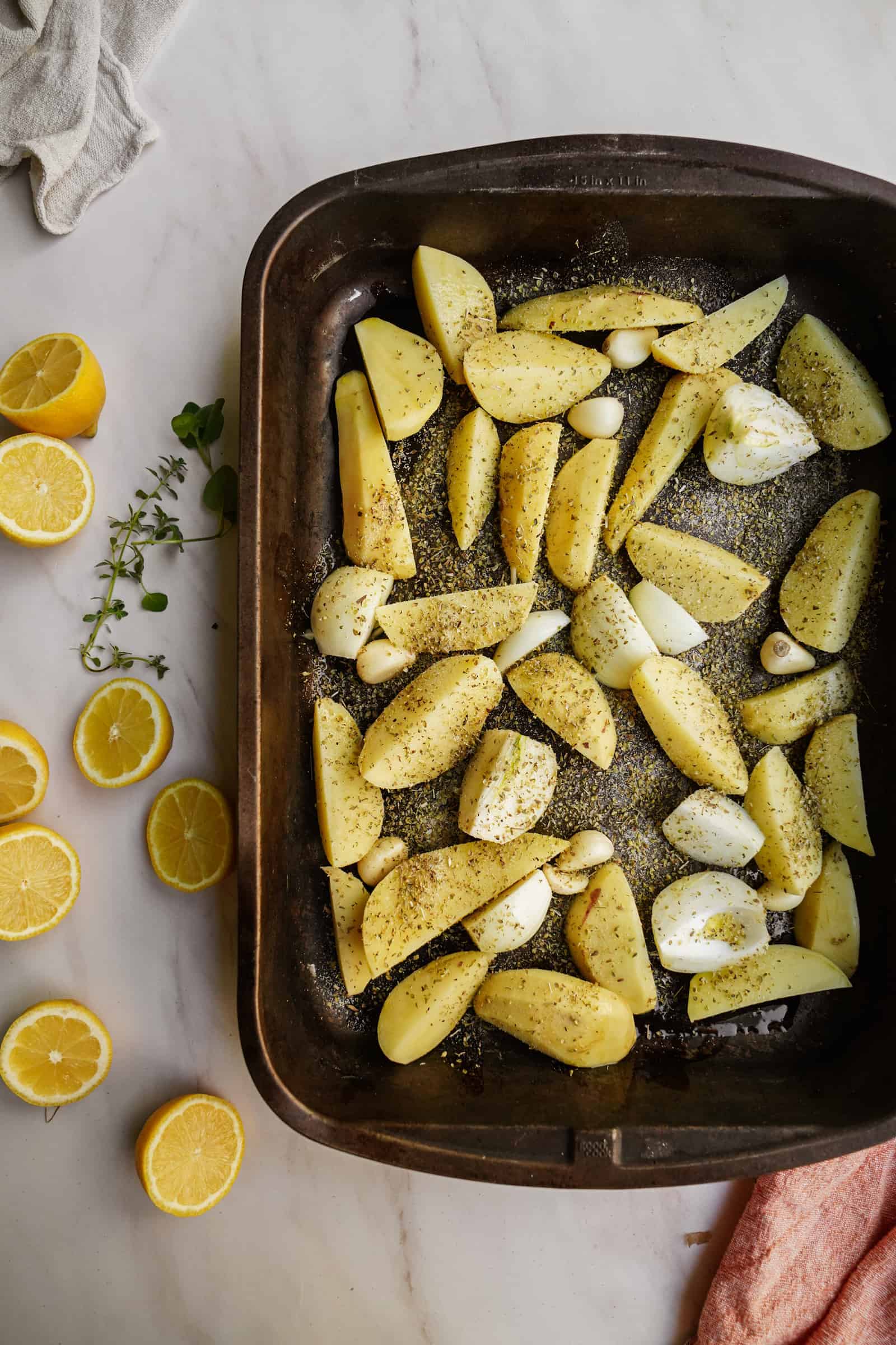 Tray with raw potatoes for Greek style potatoes