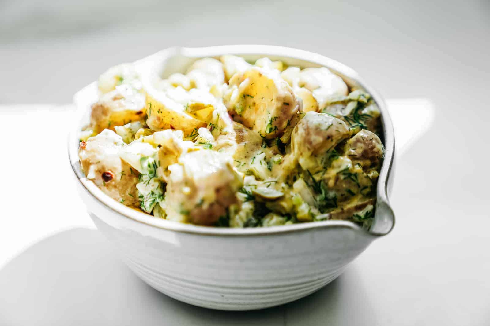 Big bowl of vegan potato salad. Creamy & ready to eat.