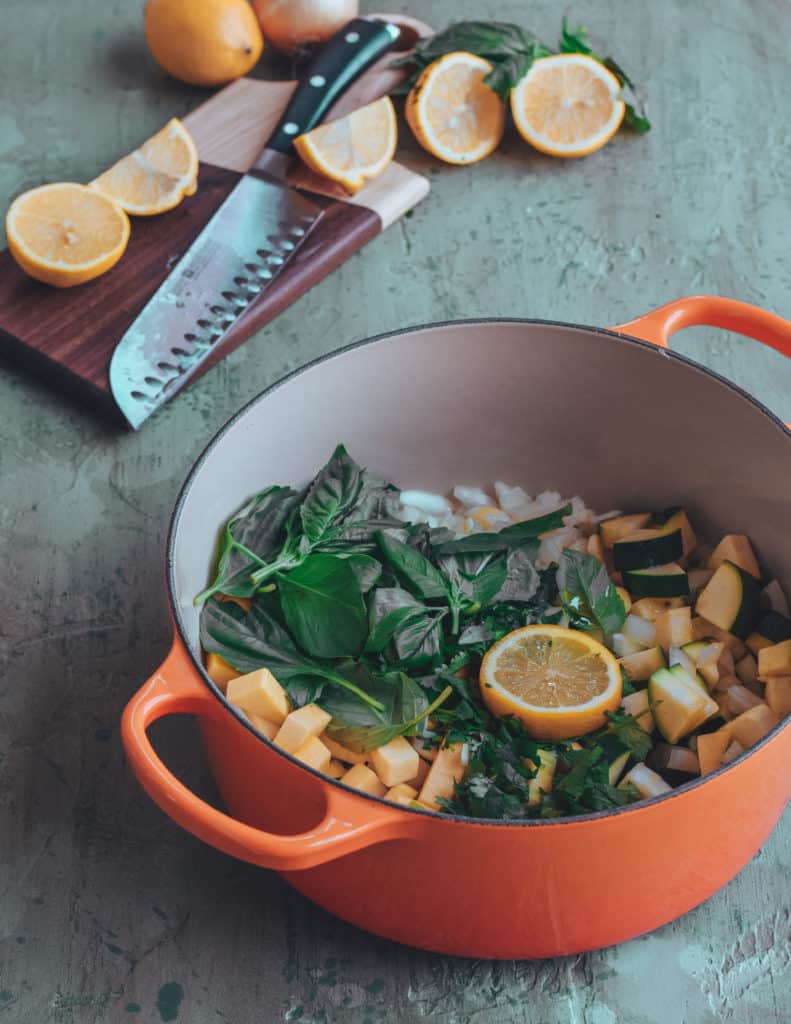 Ingredients for butternut squash casserole in a pot.