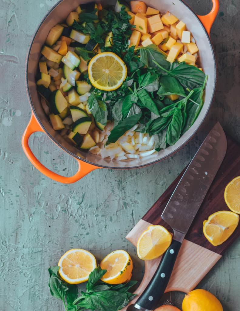 Ingredients for butternut squash casserole in a pot.