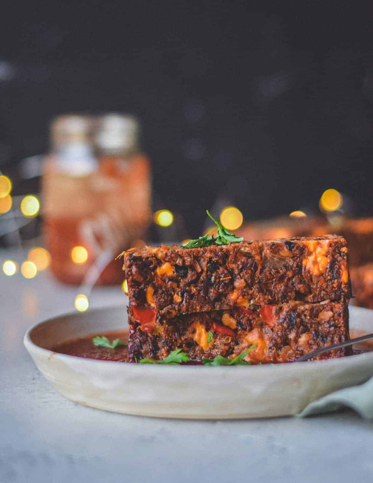 Holiday Nut Roast Recipe stacked on top of serving dish.