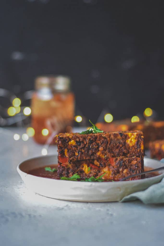 Close-up of slices of Vegan Nut Roast Recipe on plate. Perfect for Christmas.