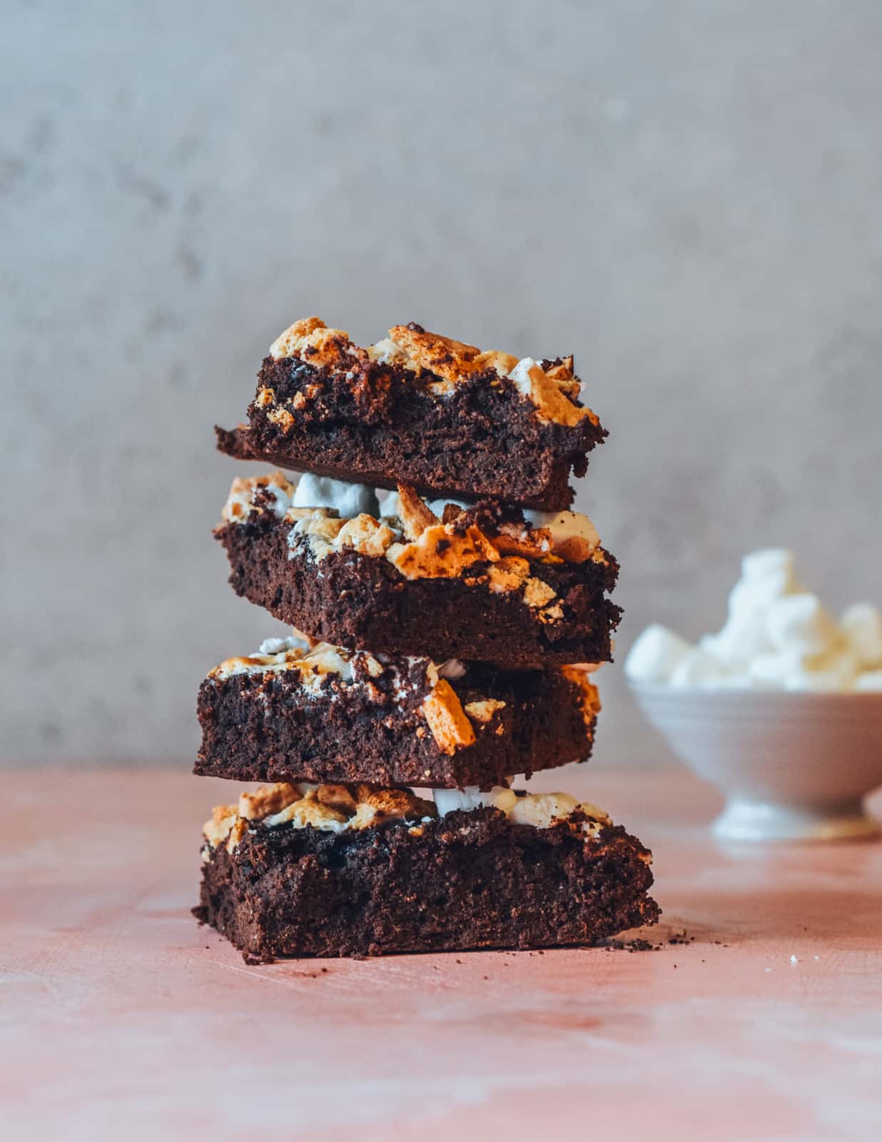 Stack of s'mores brownies on countertop.