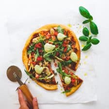This plant-based pizza dough is infused with garlic and onions and incredibly versatile which makes it perfect for the whole family on pizza night!