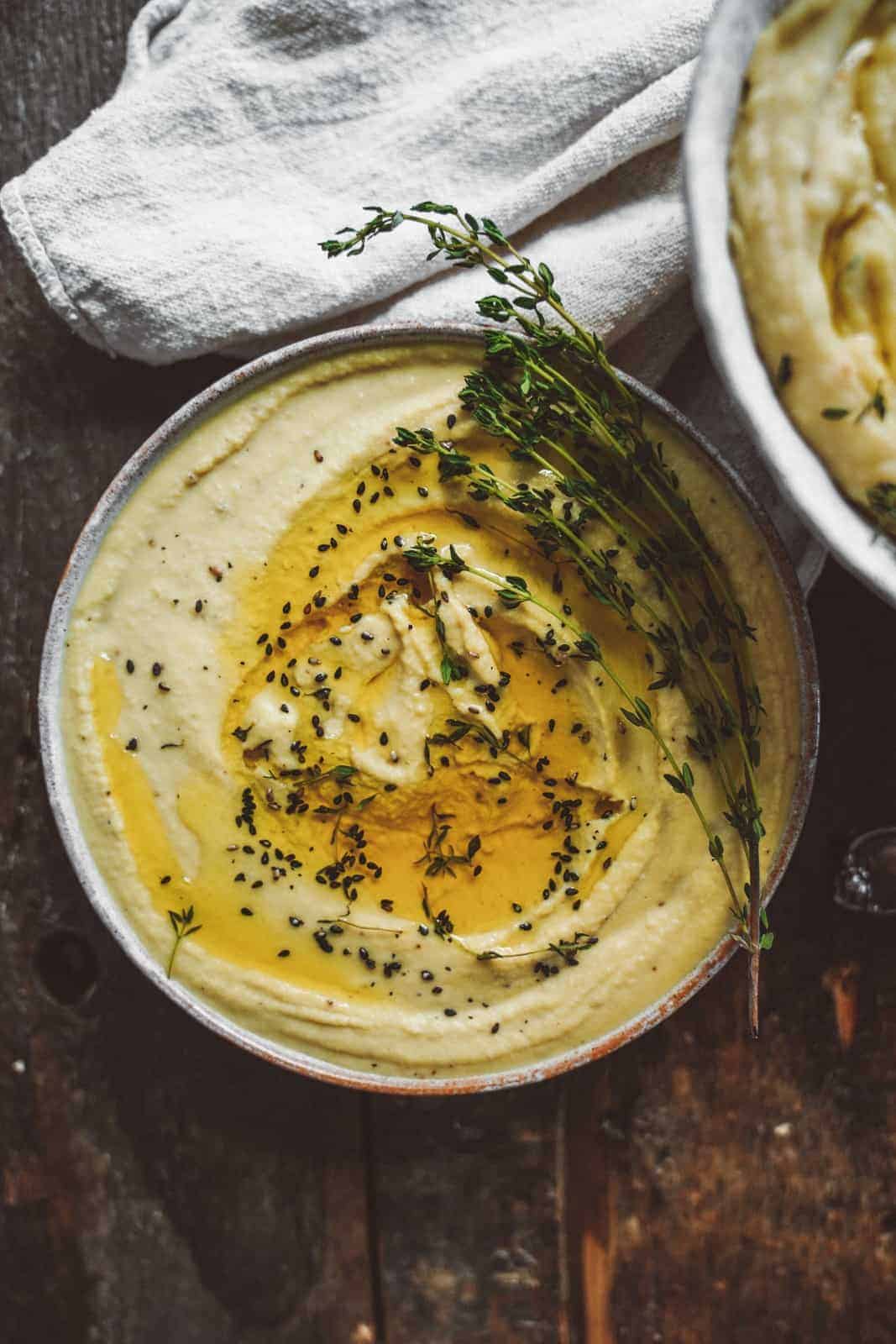 Fava bean hummus in a bowl.