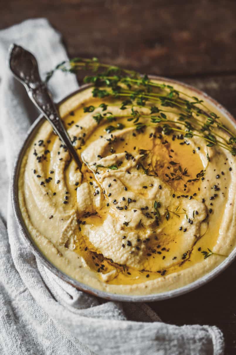 For anyone who is trying to eat more plant based, hummus is such a versatile vegan spread. This recipe uses Fava Beans as the base of this delicous dip.
