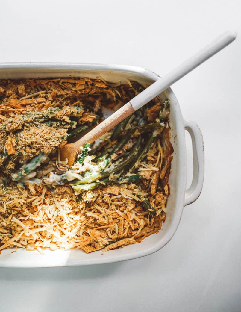 Take your holiday side dish to the next level with this vegan green bean casserole finished with a crunchy Triscuit cracker topping.