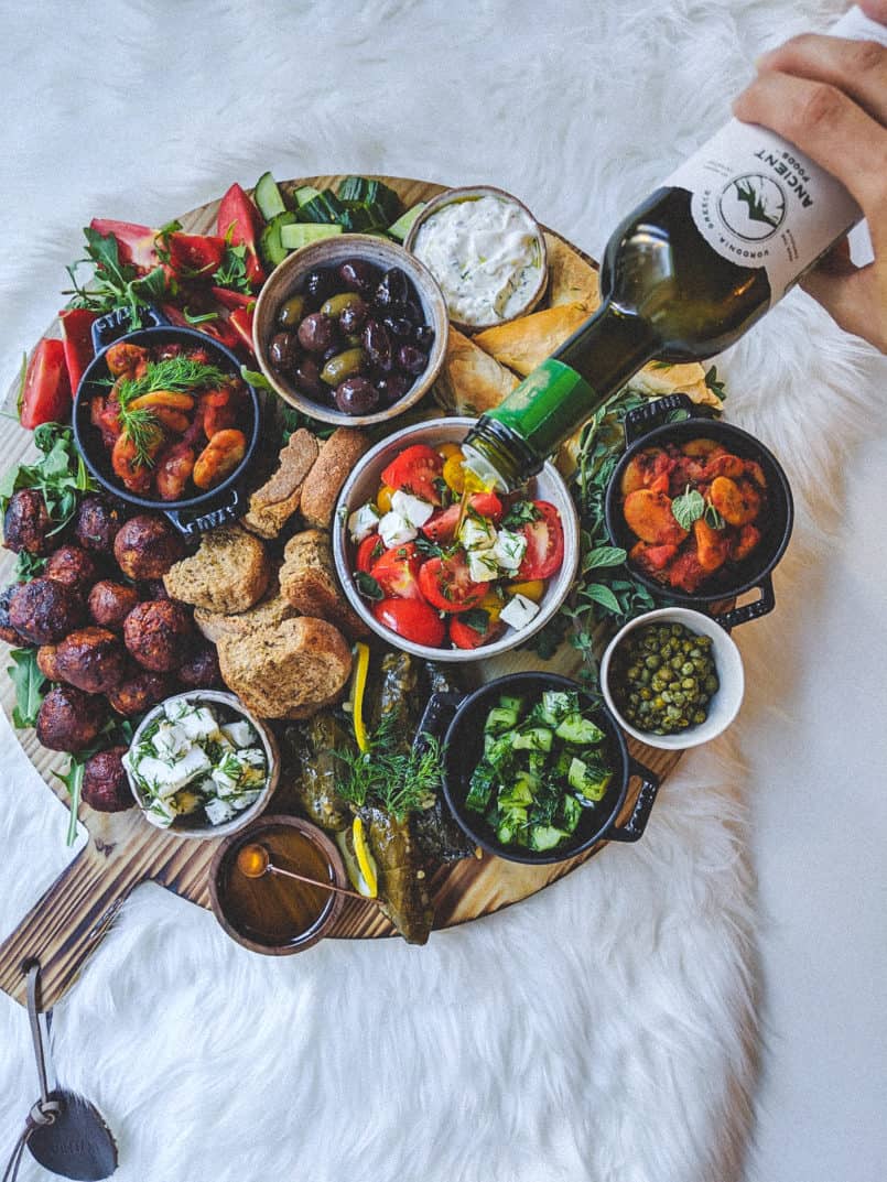 This plant based Greek platter drizzled with Ancient Foods olive oil will please all of your guests. I've included three vegan recipes in this post.