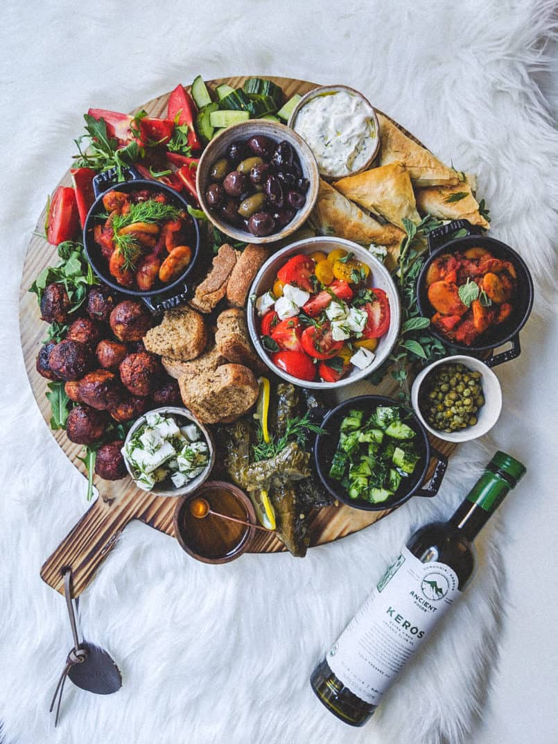 This plant based Greek platter drizzled with Ancient Foods olive oil will please all of your guests. I've included three vegan recipes in this post.