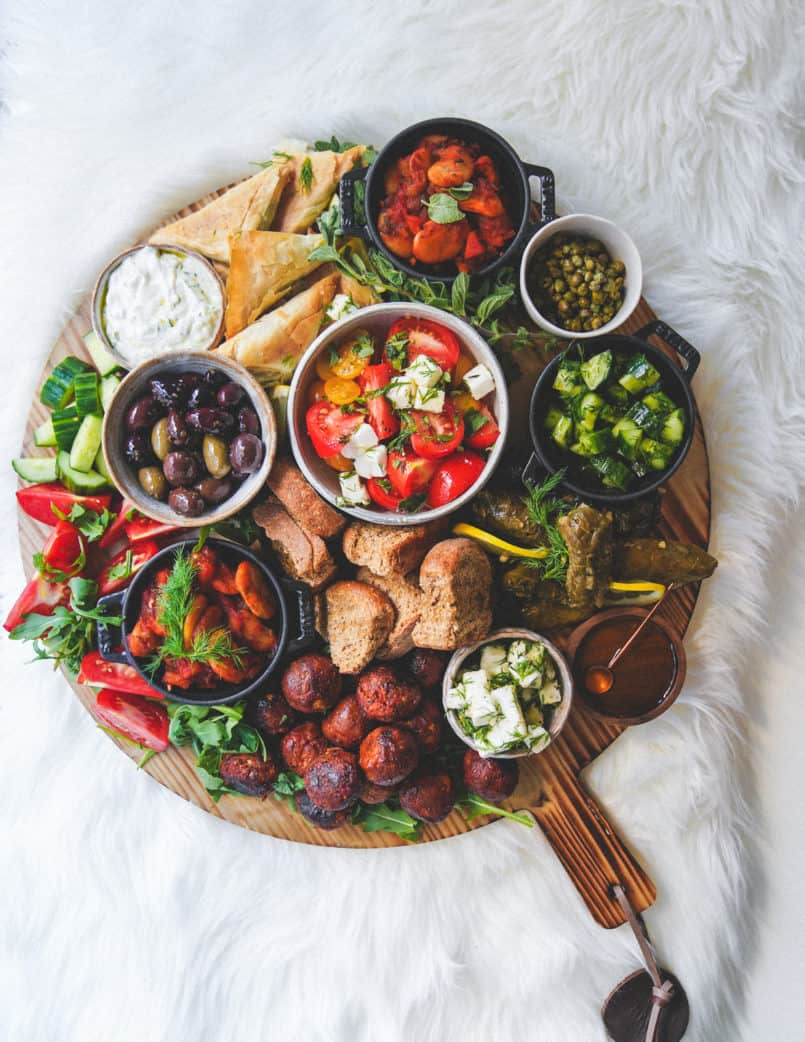 This plant based Greek platter drizzled with Ancient Foods olive oil will please all of your guests. I've included three vegan recipes in this post.