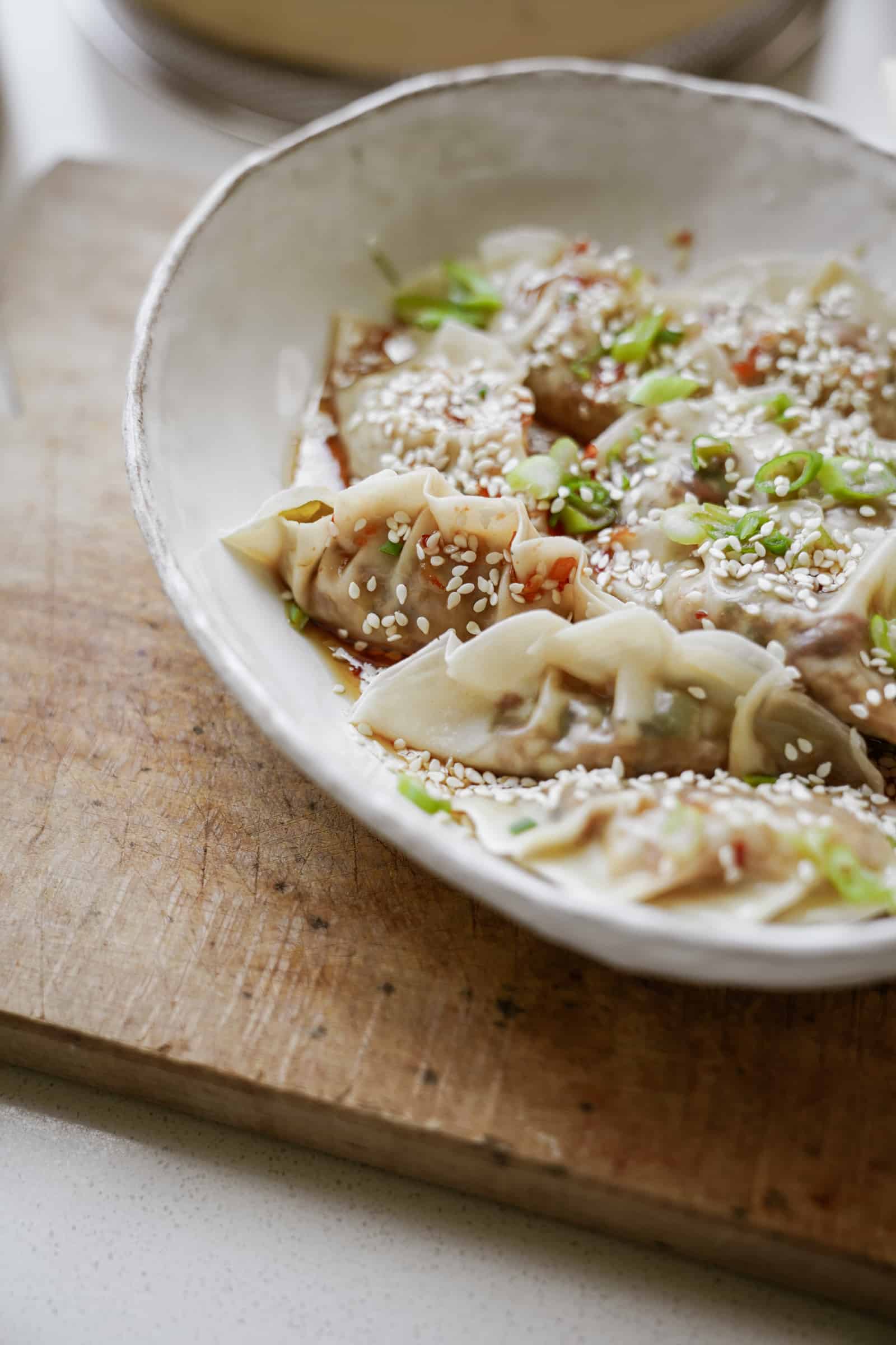 Close-up of toppings on vegan potstickers