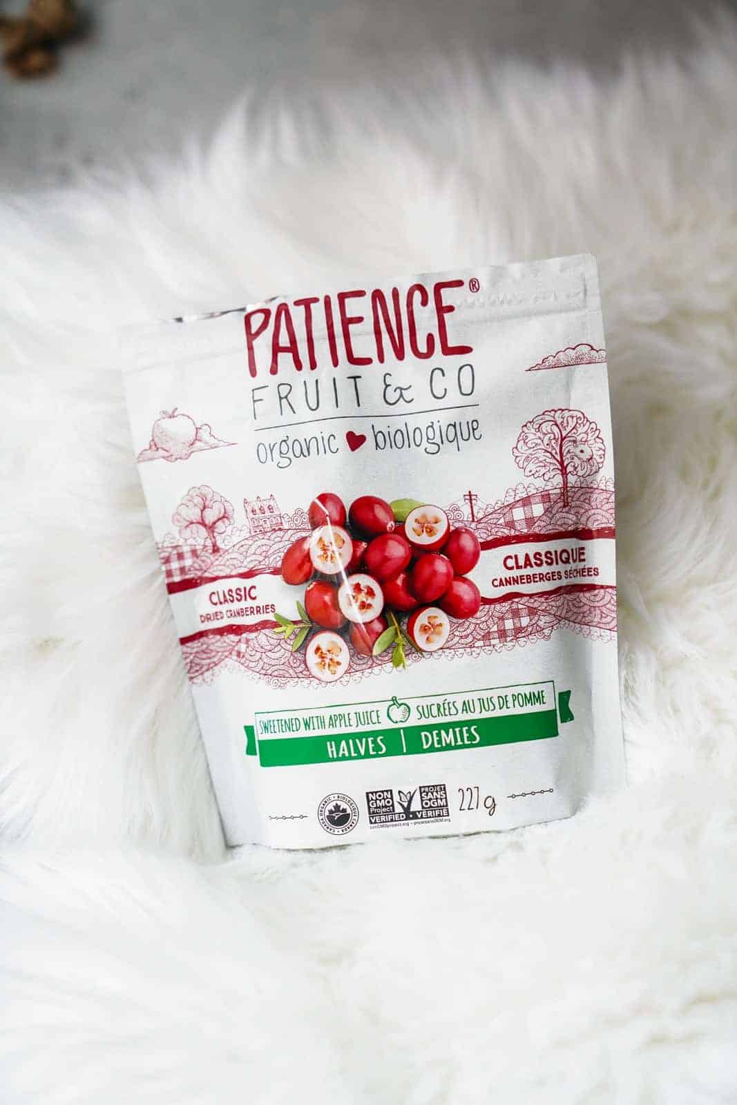 Patience Fruit & Co. Organic Vegan Cranberries laying on fluffy rug.