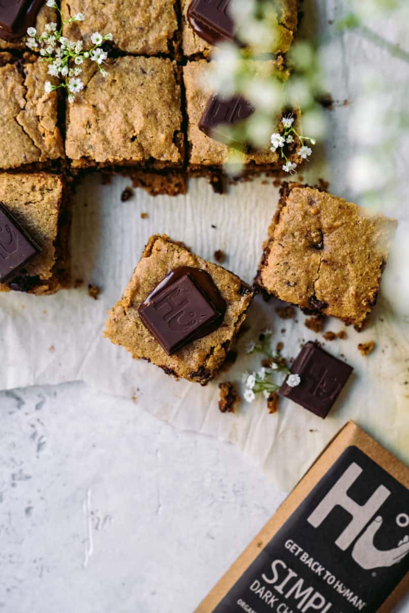 Spring is here and we are making super easy one bowl chocolate chunk vegan blondies! These vegan blondies are all the gooey, crunchy goodness you need.