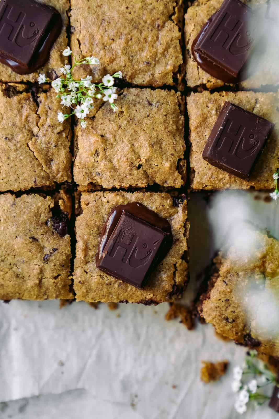 Overhead shot of vegan blondies with chocolate chunks.