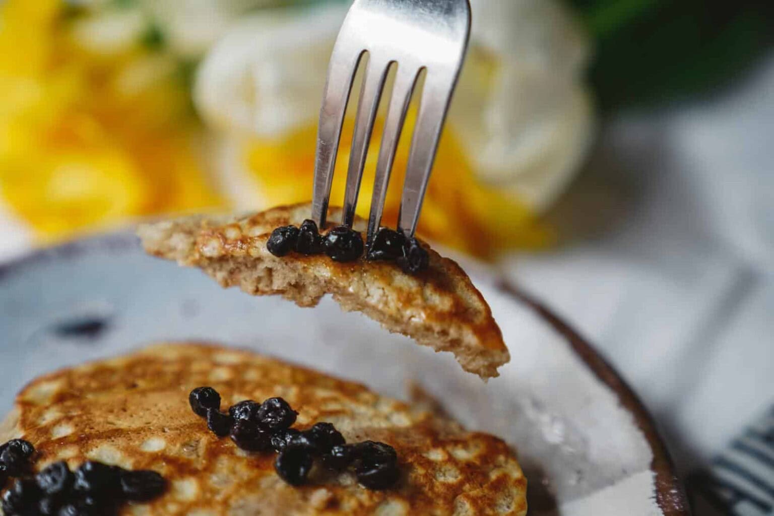 It's time to up your breakfast game, and this easy fluffy pancake recipe is perfectly paired with my homemade berry simple syrup is a great place to start!