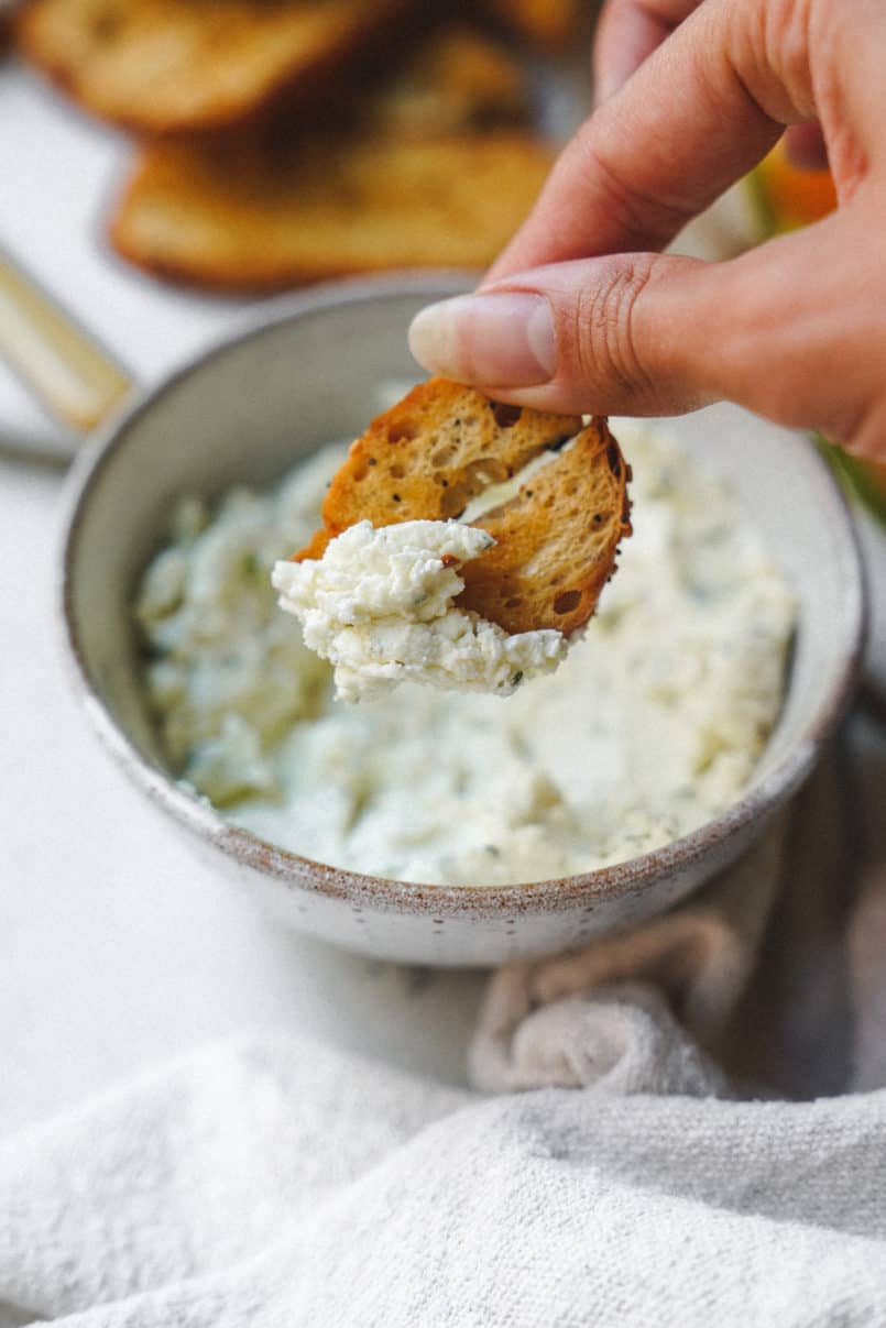 This vegan garlic herb cream cheese is so smooth and rich, it is perfect for spreading over the Silver Hills Organic Everything Bagels.