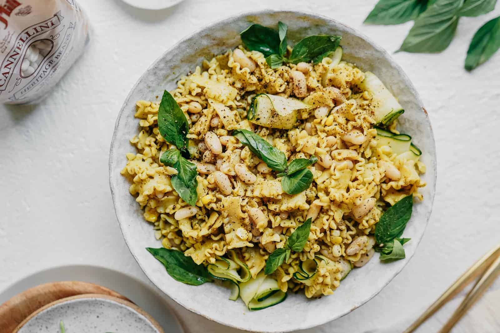 Vegan Pasta recipe that is perfect for your next potluck. Big bowl on white countertop.