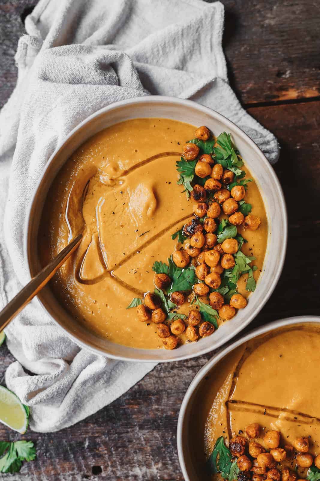 Soup Idea: Vegan Vegetable Soup. Creamy and delicious in a big serving bowl with a spoon