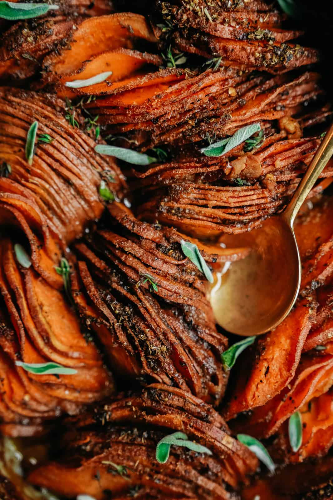 close-up of vegan sweet potato casserole with serving spoon