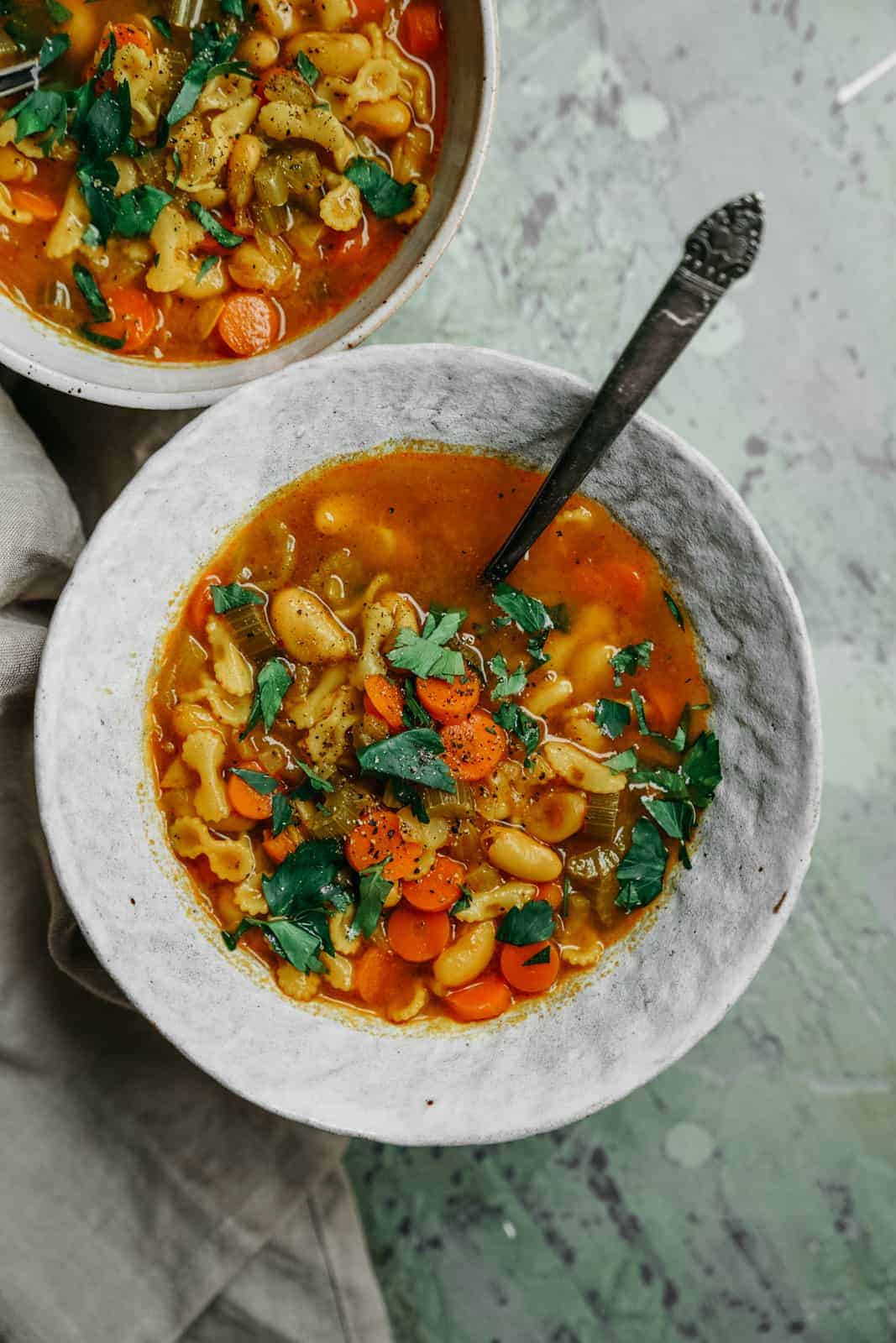 Soup recipe feature with veggies in a bowl