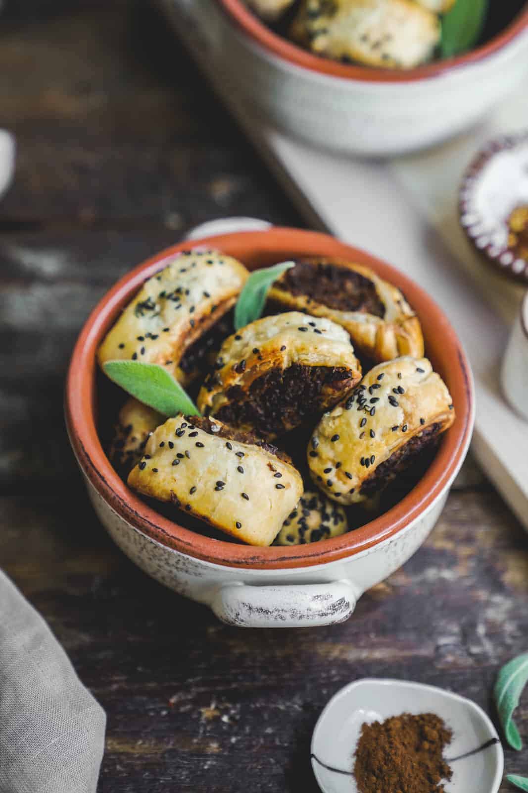 Close-up of vegan sausage rolls in a bowl