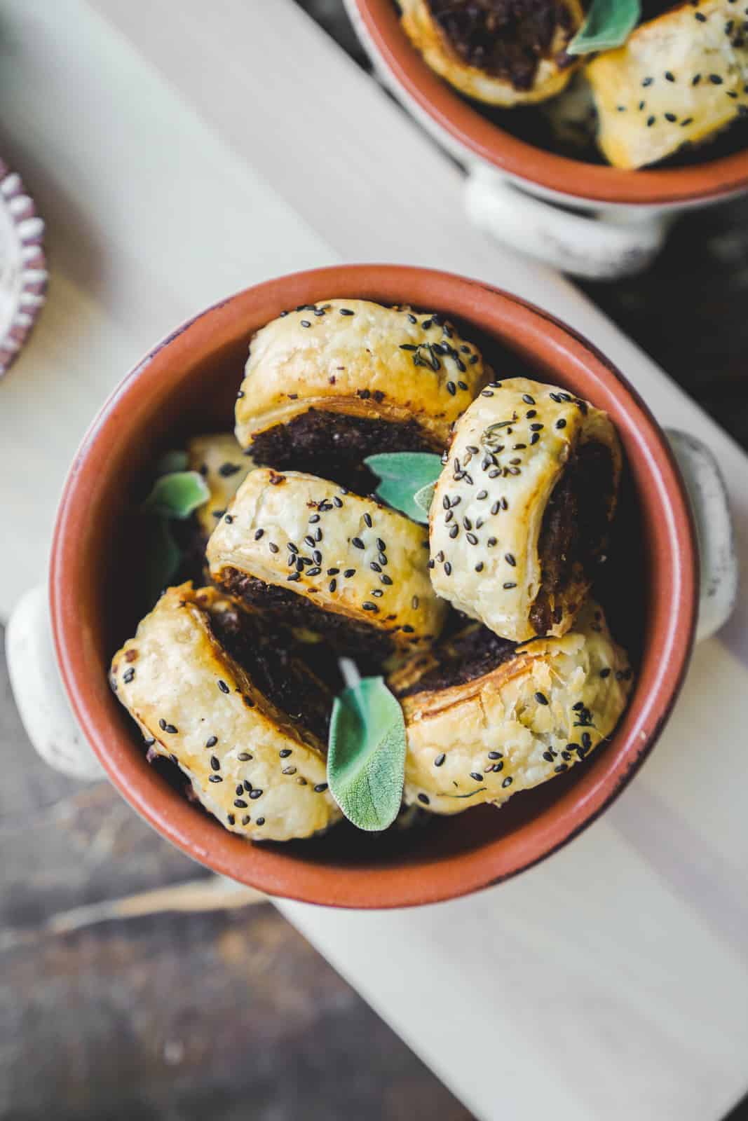 Close-up of vegan sausage rolls in a bowl