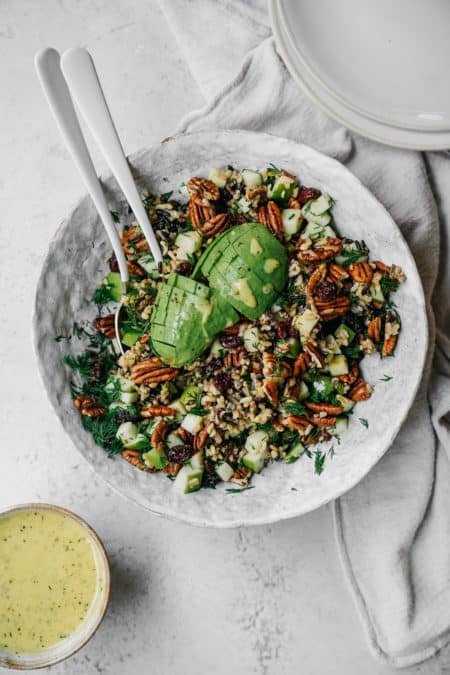 High Protein Vegan Meal Prep recipe for a colourful salad sitting in a big bowl on white countertop.