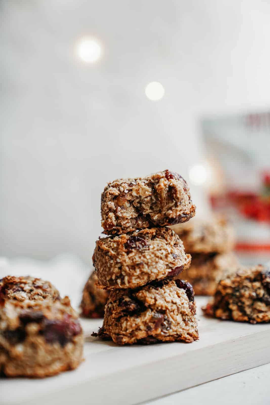 Power Ball Muffin Tops stacked on top of eachother on counter. A perfect quick vegan meal for breakfast