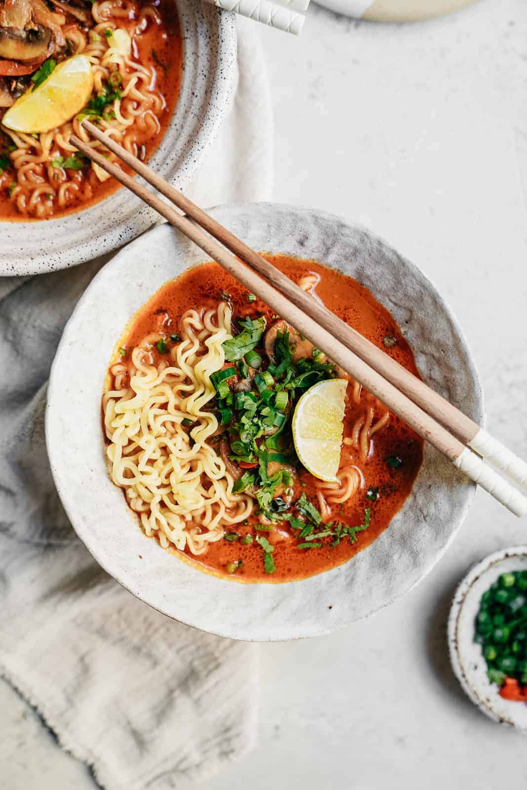 Easy Curry Vegetarian Ramen Recipe in serving bowls with chopsticks