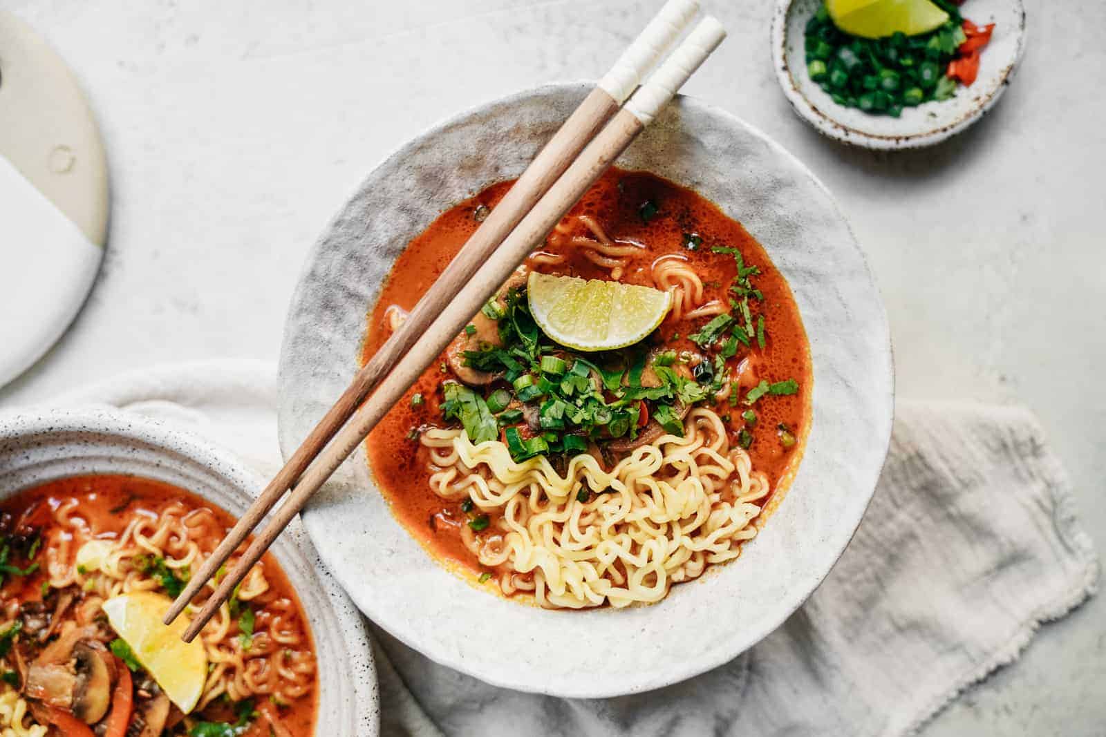 Easy Curry Vegetarian Ramen Recipe in bowls with chopsticks