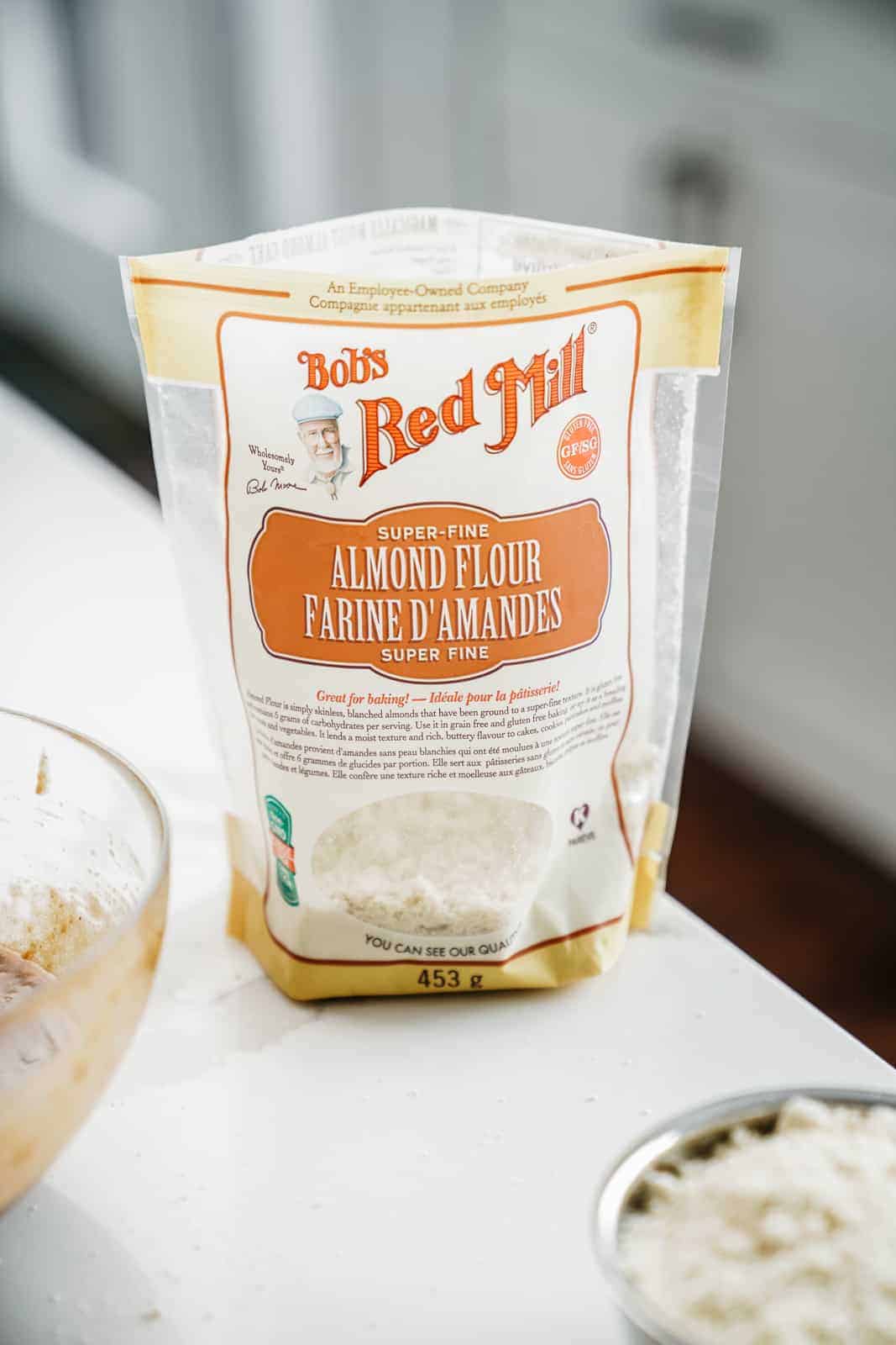 Bag of Bob's Red Mill Almond Flour sitting on counter.