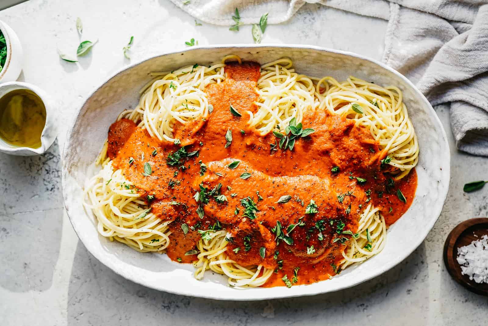 Food photography tricks that will help you ace food photos like this vegan spaghetti sauce in a big serving bowl.