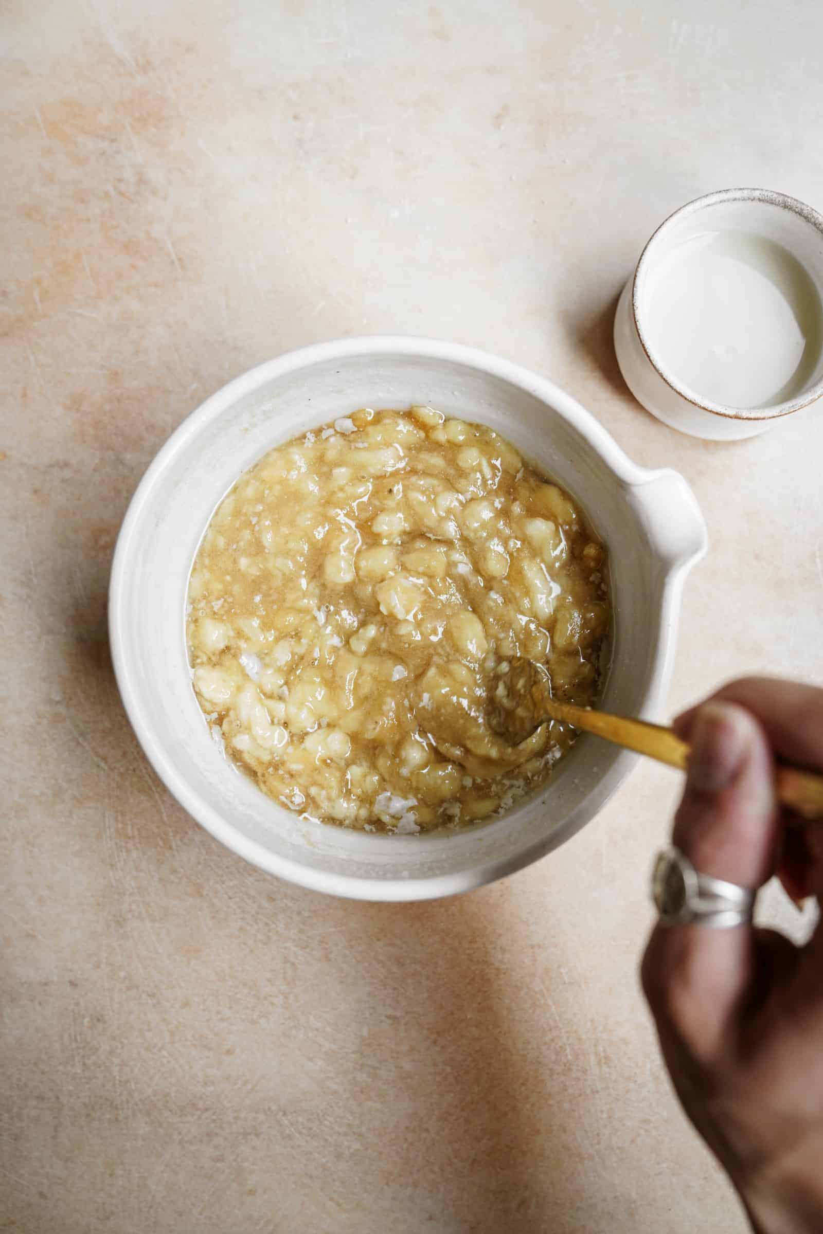 Mashed bananas in a bowl for muffins