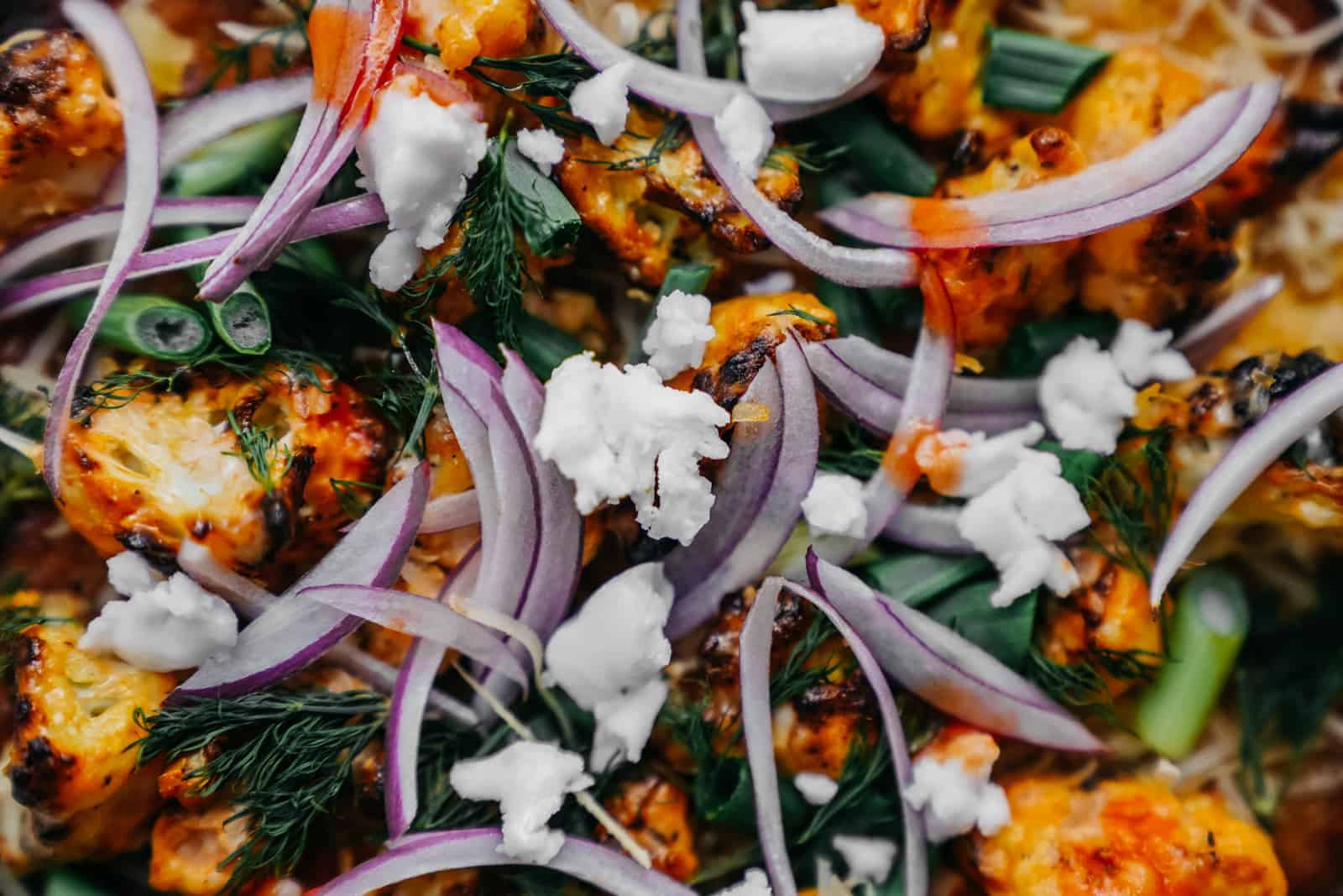 Close-up of ingredients on vegan cauliflower pizza crust recipe