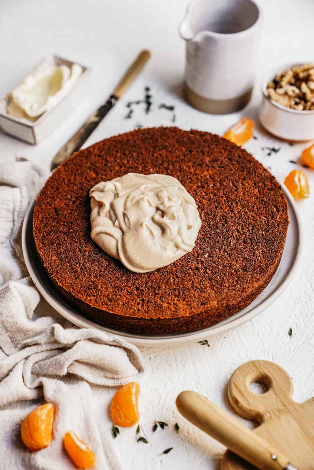 Cashew icing being spread on top of this Vegan Carrot Cake recipe.