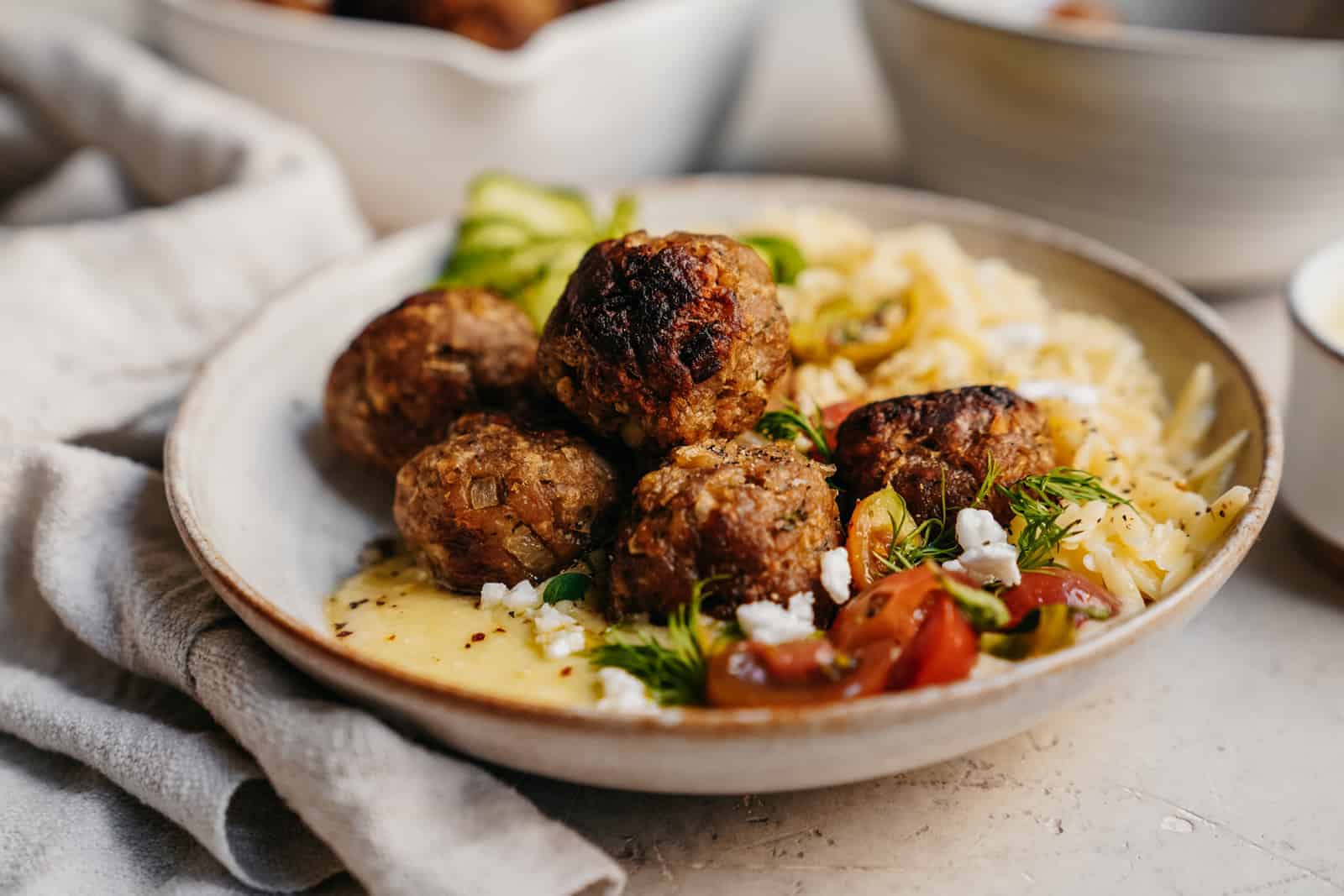 Vegan Greek Meatballs with Whipped Feta and Creamy Orzo FoodByMaria