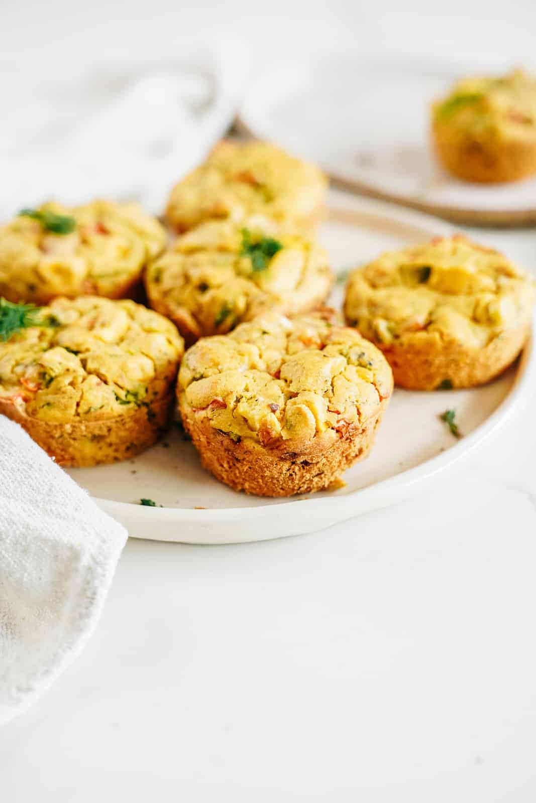 A plate of Savoury Vegan Chickpea Flour Muffins on a plate, one of my fav chickpea flour recipes