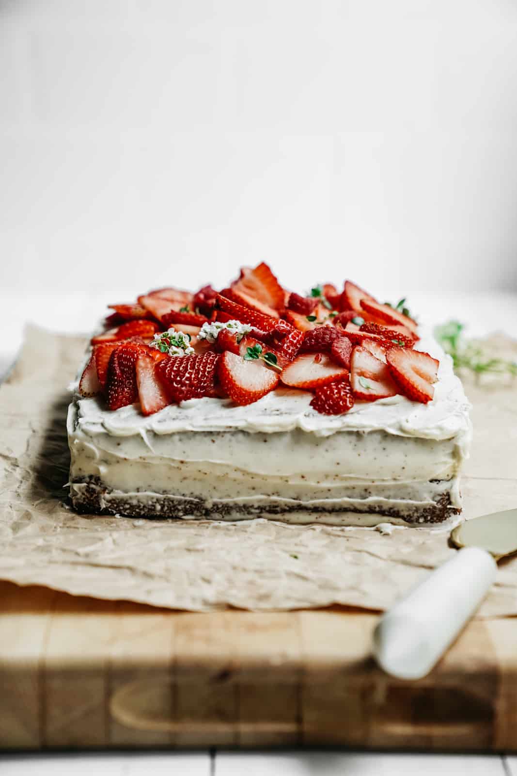 Honey cake on counter with knife