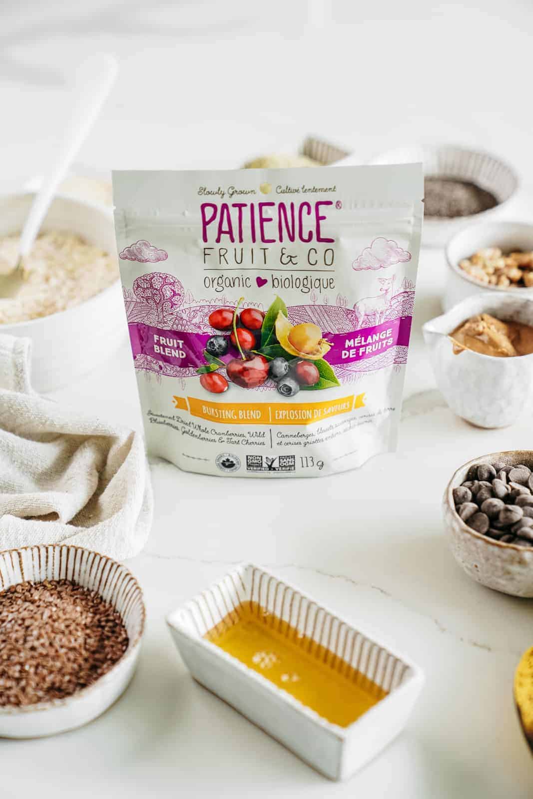 Patience Fruit & Co Berry Blend sitting on table with other ingredients for Vegan Granola Bars in the background