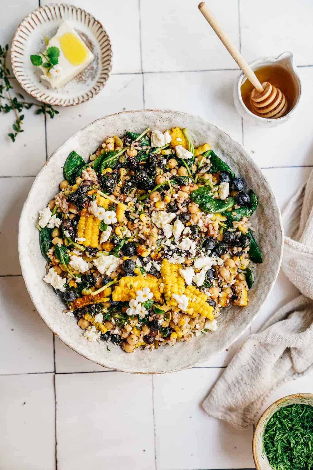 A big vegan picnic salad on a countertop to demonstrate Maria's top food photography tips.