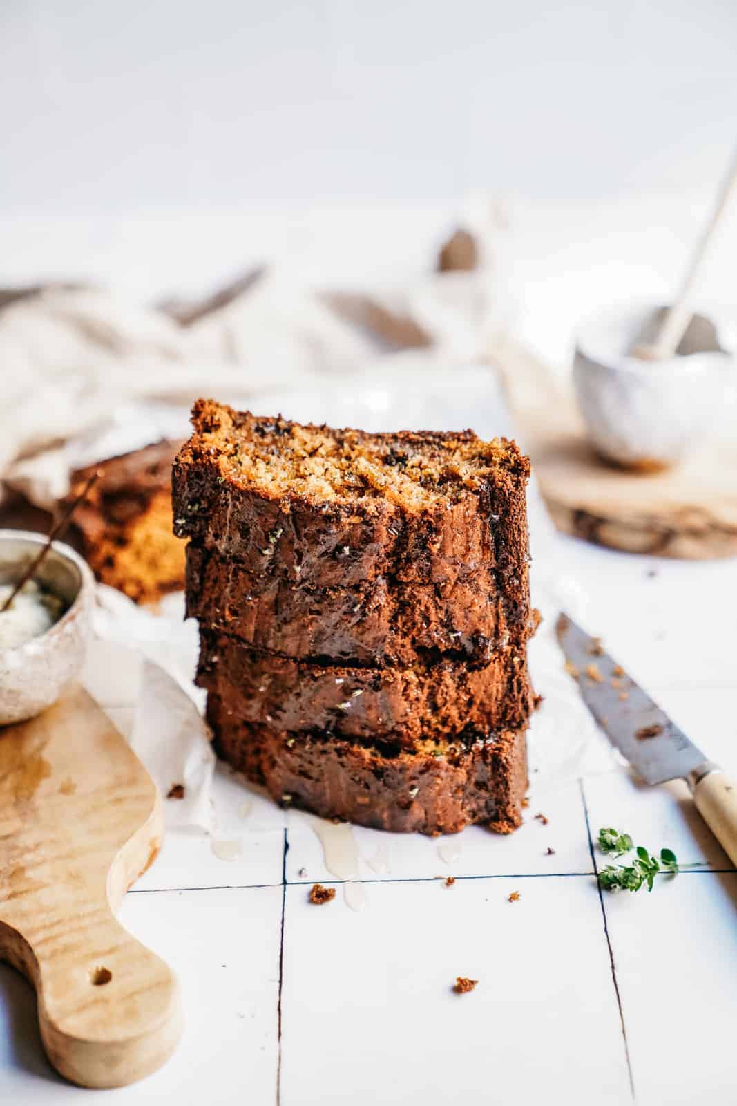 Stack of banana bread slices on countertop 