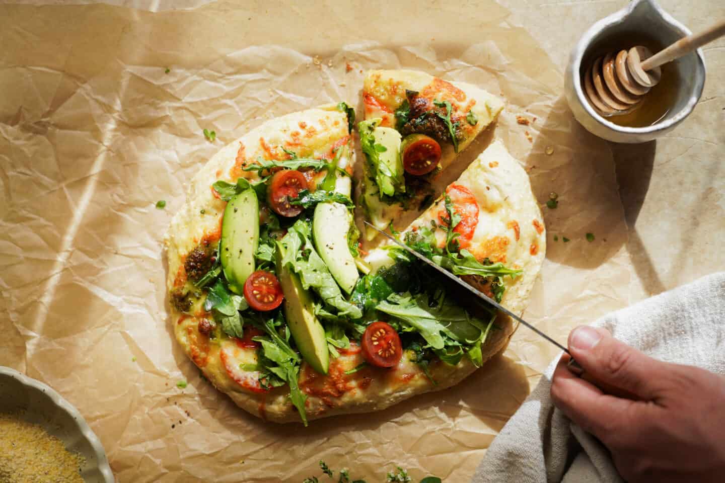 A slice is being cut of the Vegetarian Breakfast Bread