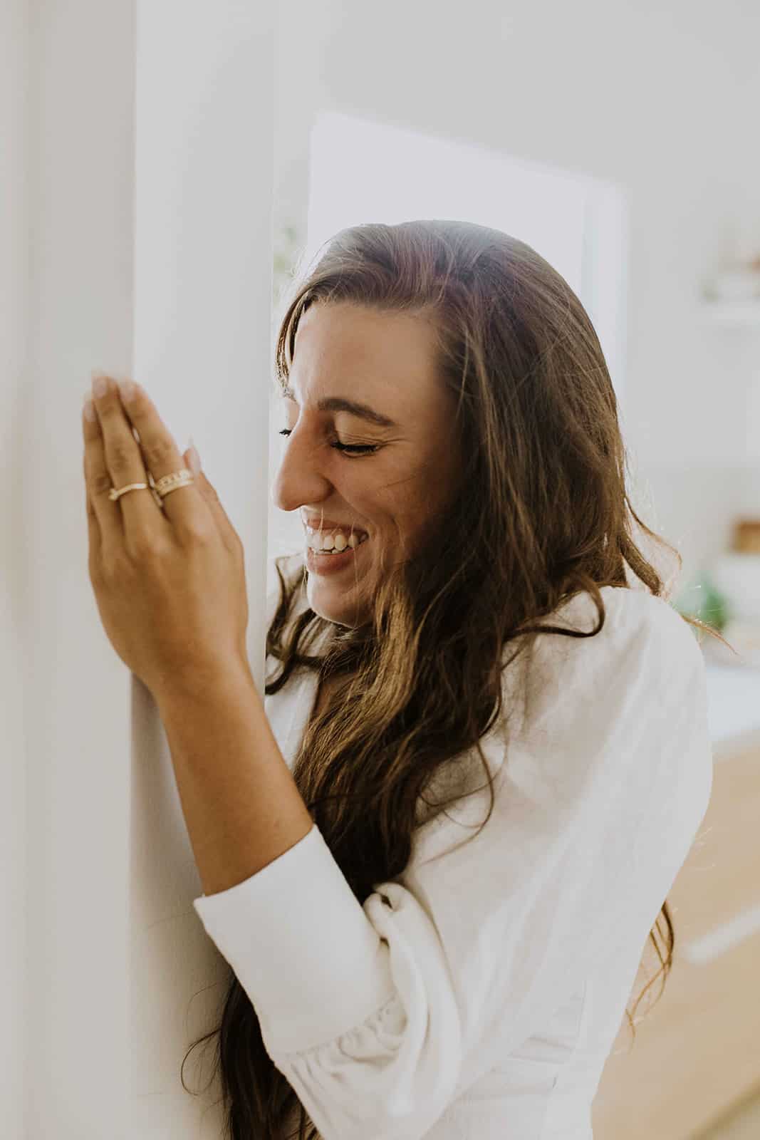 Maria, the food blogger behind FoodByMaria laughing