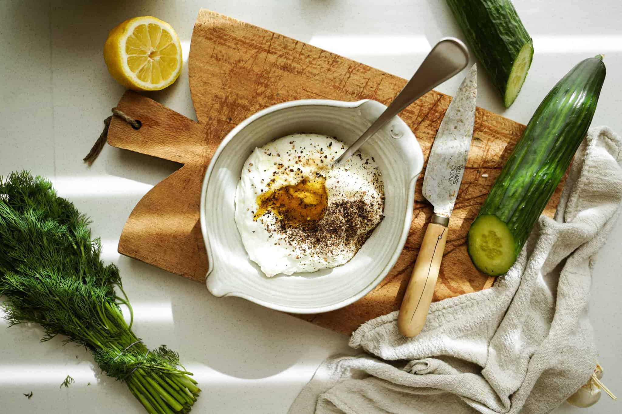 Ingredients for Greek Tzatziki Sauce in a bowl