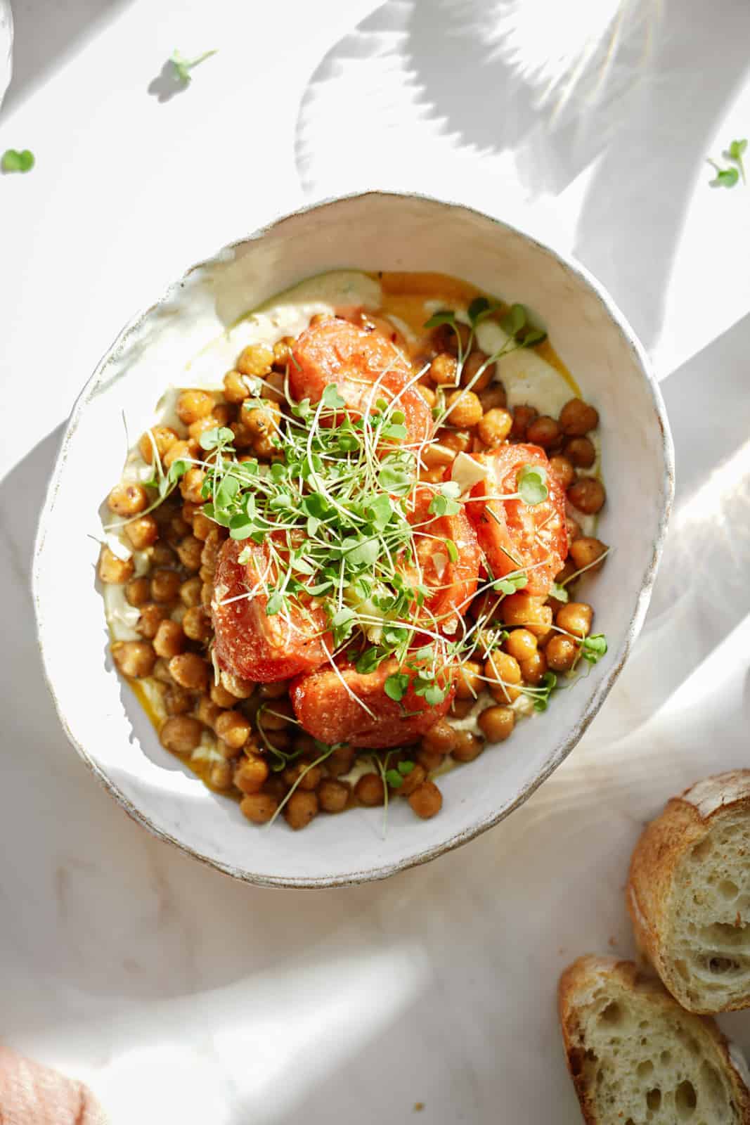 Oven roasted chickpeas in a white serving dish