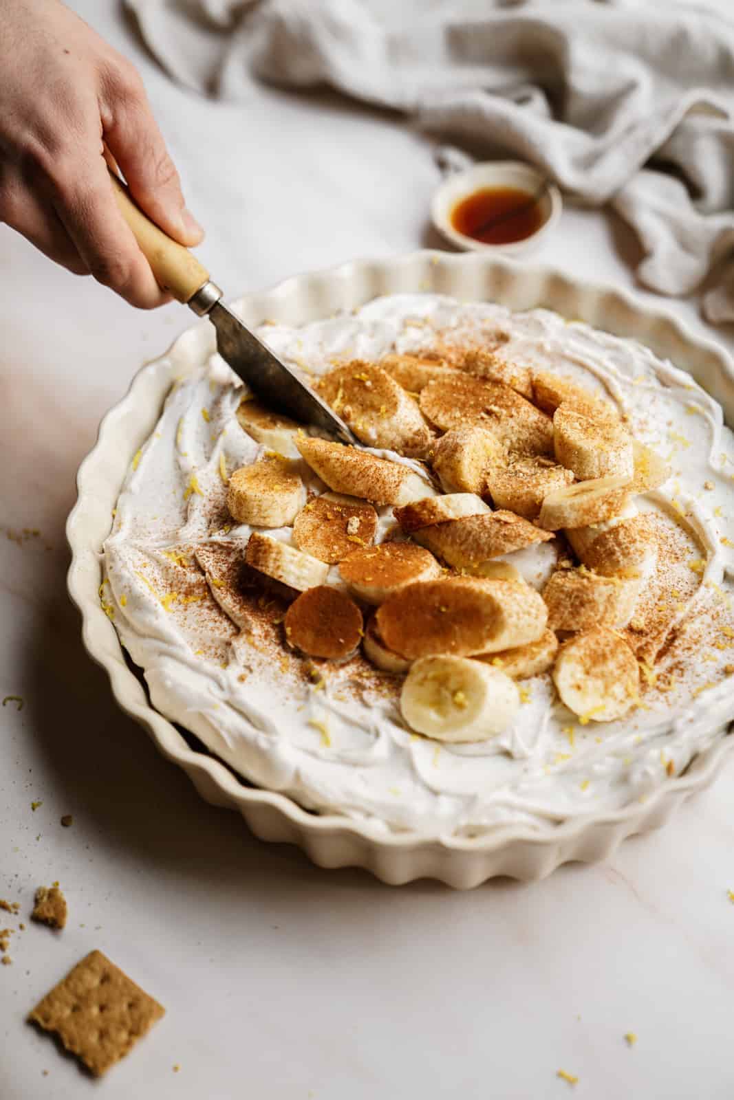 Easy Vegan Banana Cream Pie on countertop in pie plate