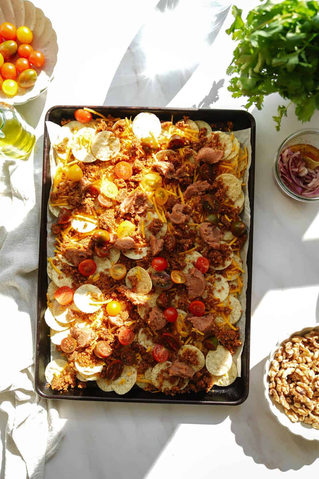 Vegan Taco Meat Nachos on a big baking sheet